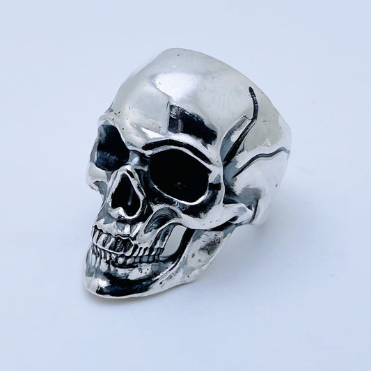 Sterling silver classic skull ring with polished finish and dark eye sockets, finished by hand in Morocco – Silver Legends by Maison Assam