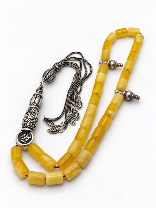Natural Baltic amber tasbih with sterling silver tassel and engraved silver medallion by Maison Assam
